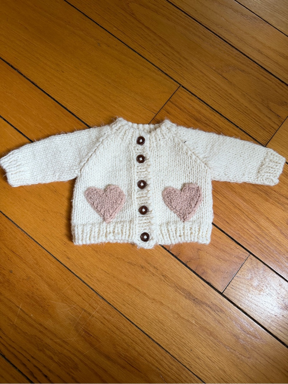 Cream Knit Baby Cardigan with Pink Heart Pockets